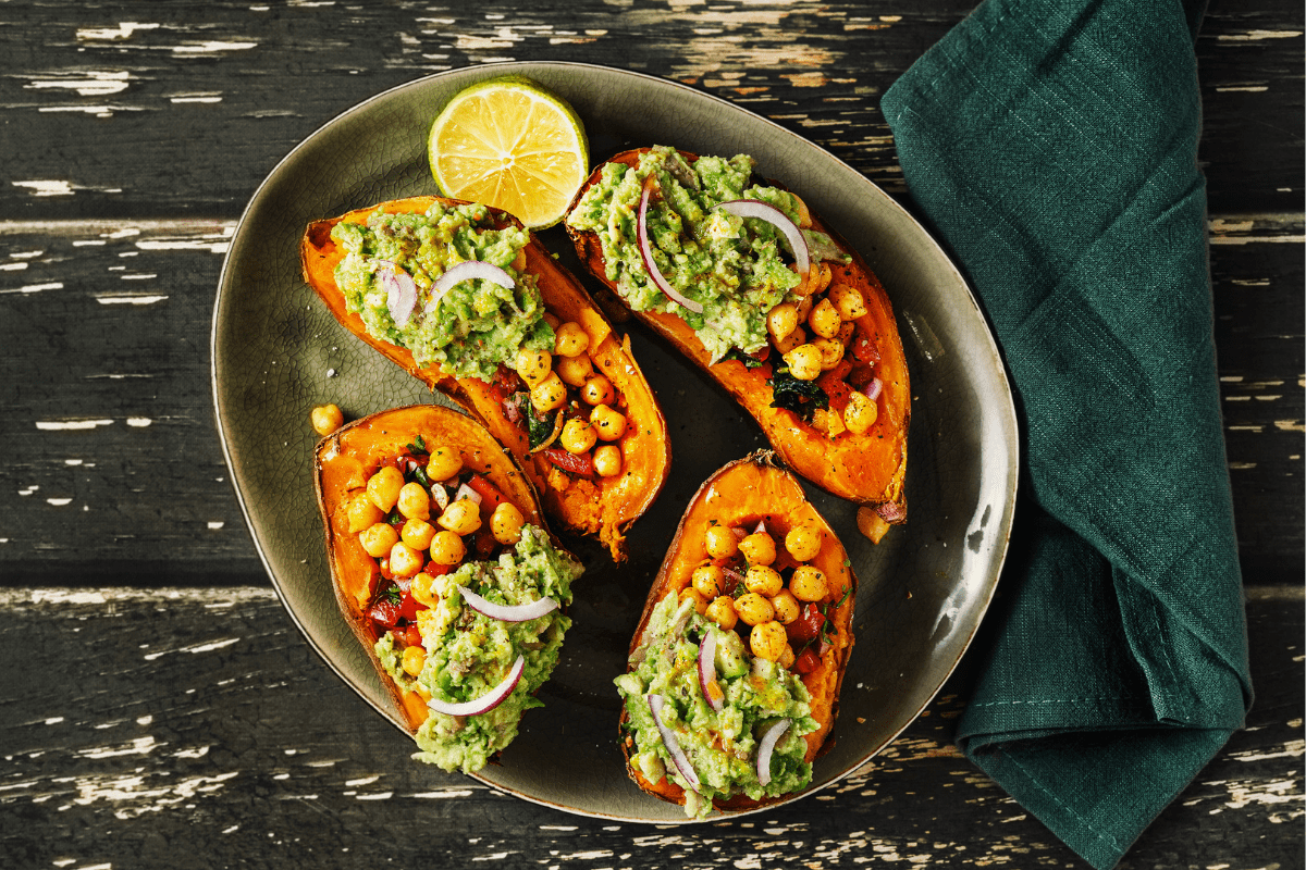 Baked sweet potato stuffed with chickpeas and avocado.