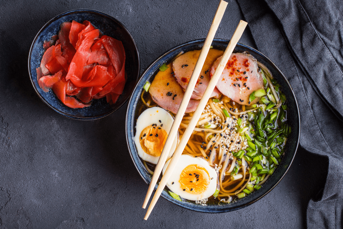 Bowl of bone broth ramen with shiitake mushrooms.