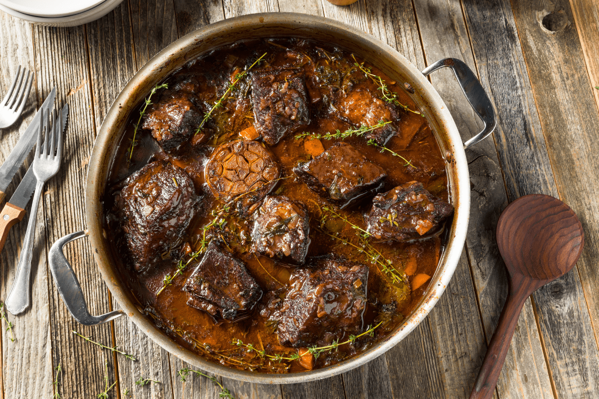 Braised short ribs in rich red wine sauce.